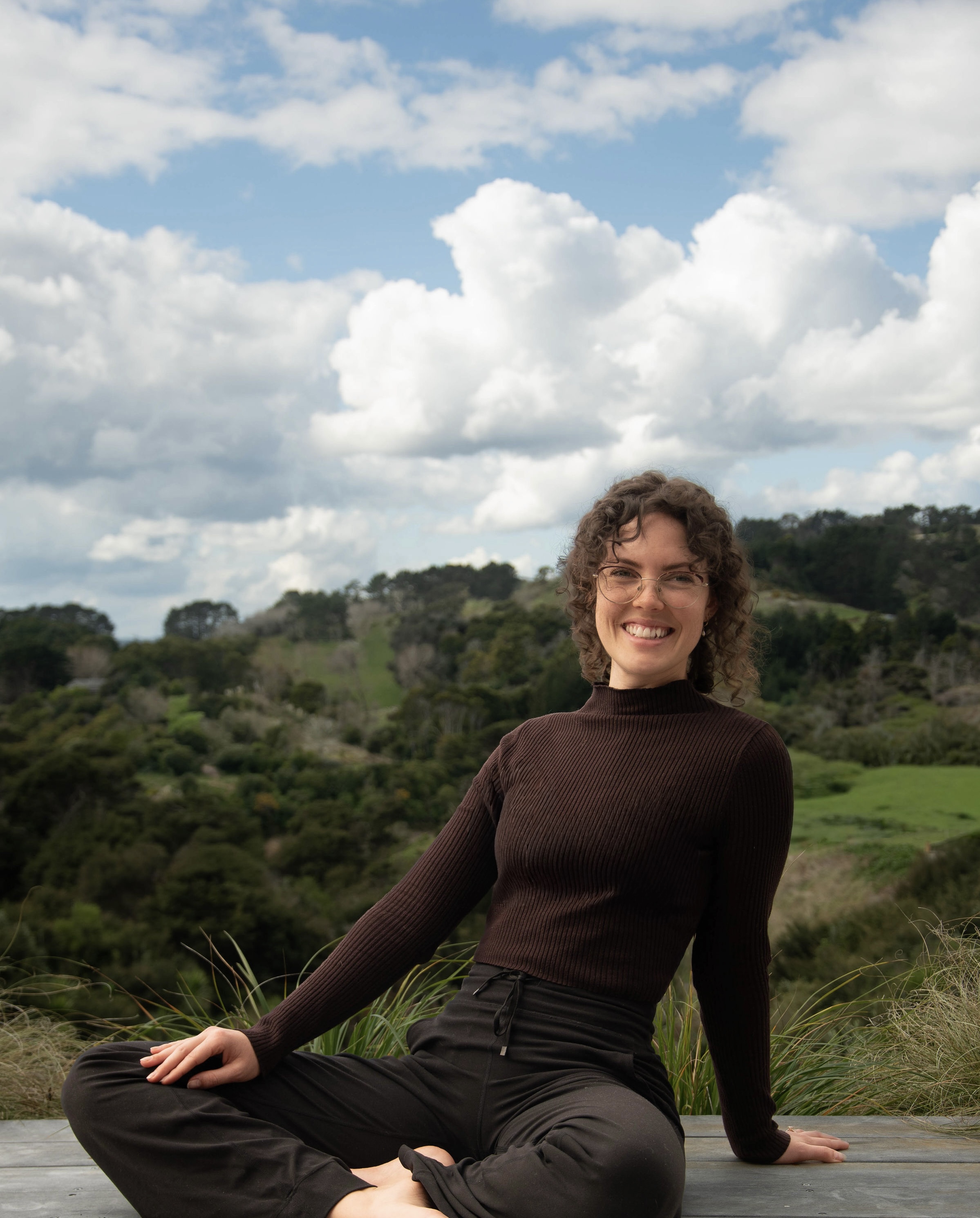 Aroha outdoors in a green landscape